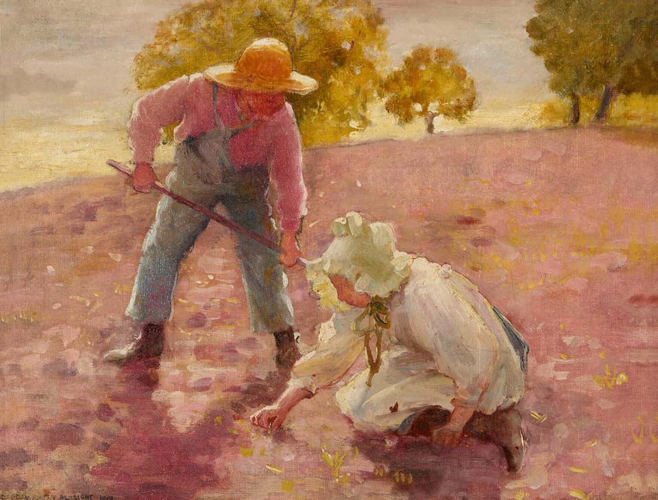 Boy and girl planting a field