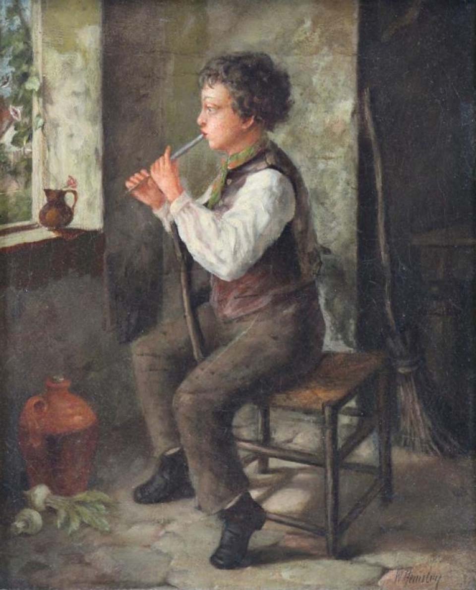 Boy playing the pipe