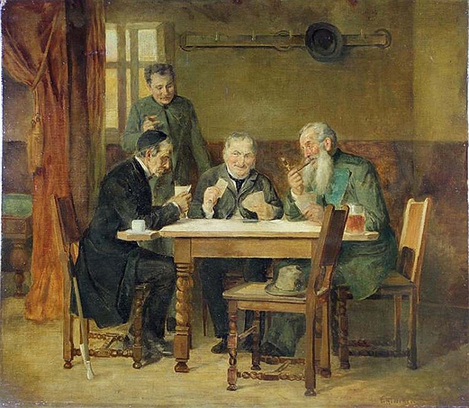 Three men playing cards at a bar table