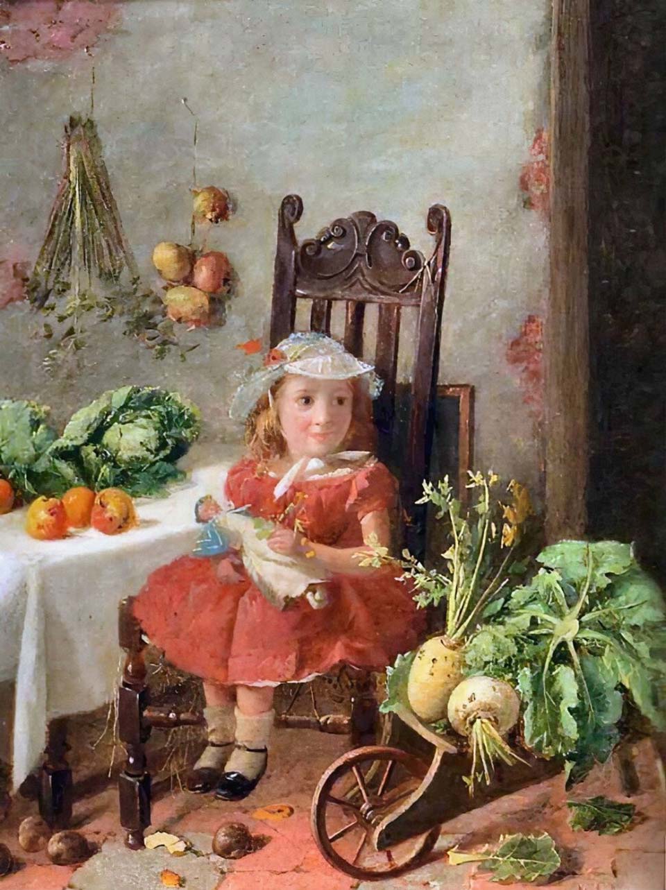 Girl seated holding a doll