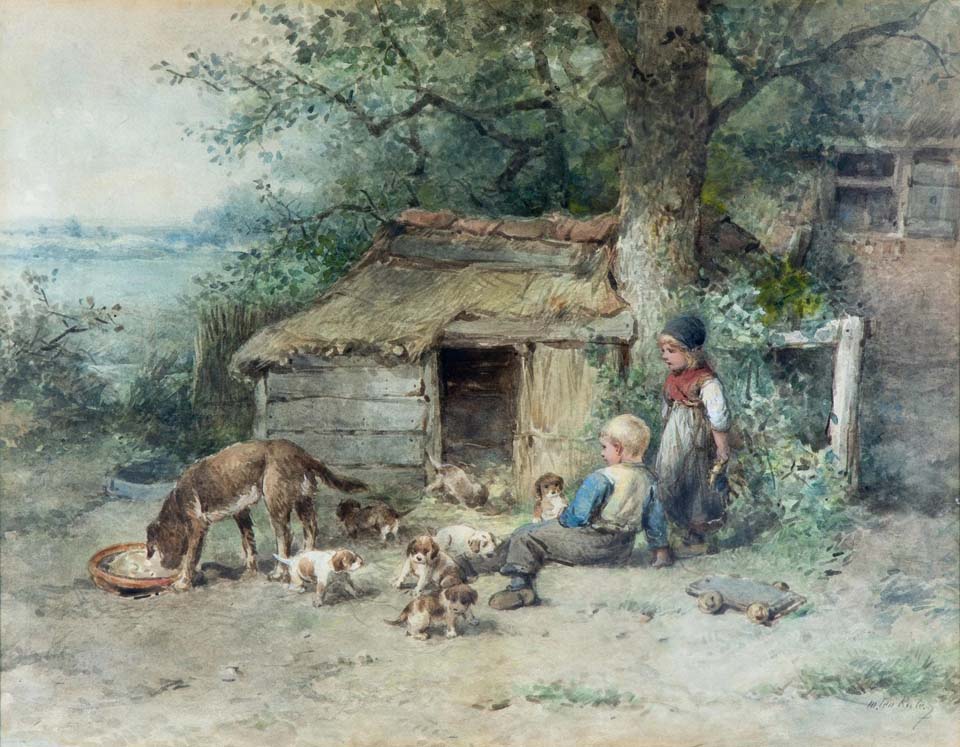 Children playing with the litter of puppies