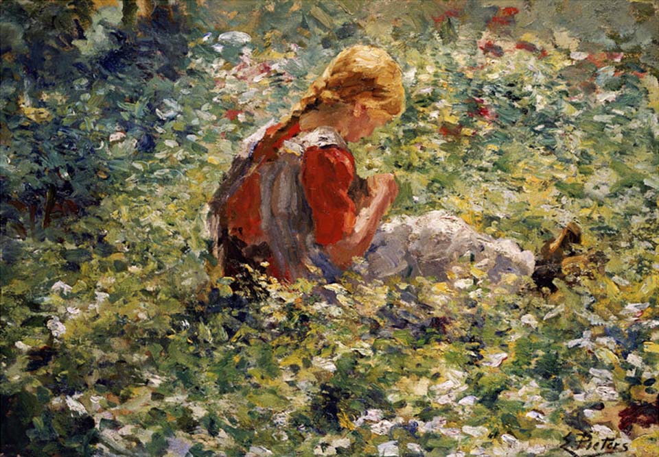 A young girl in a flower garden