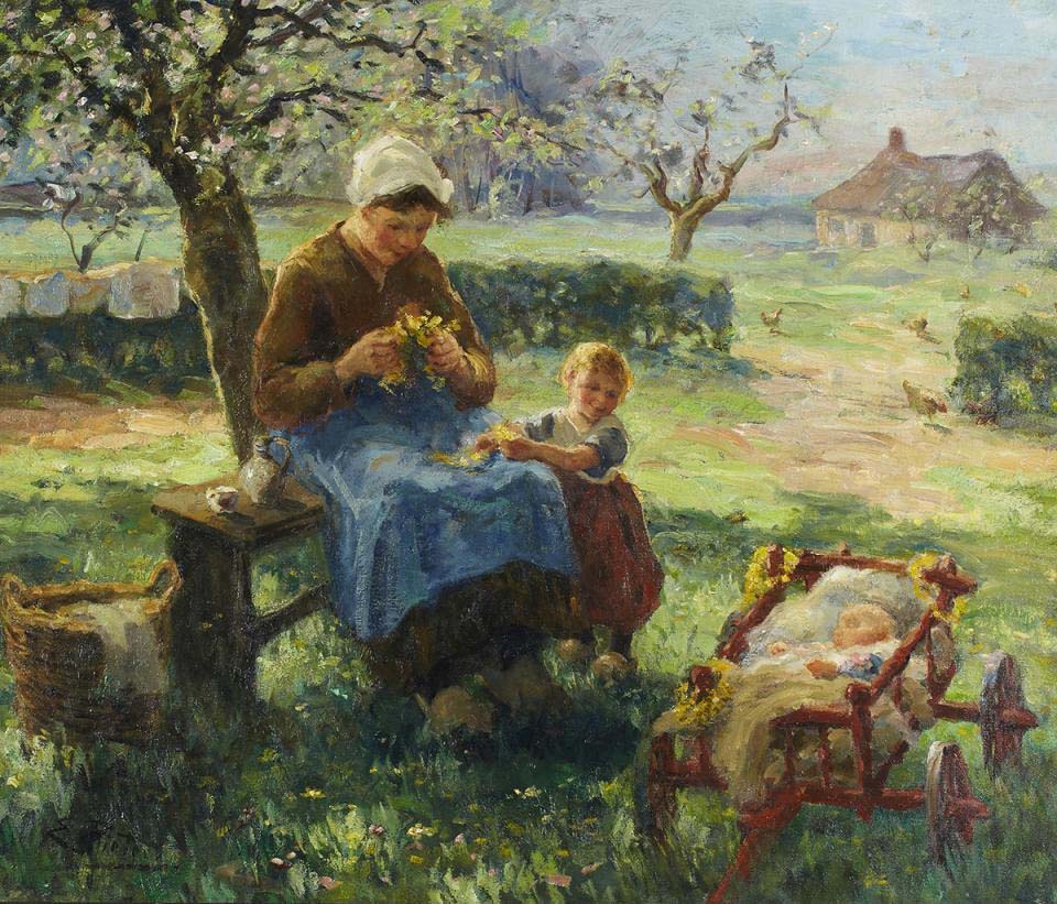 Mother and her children in a spring orchard