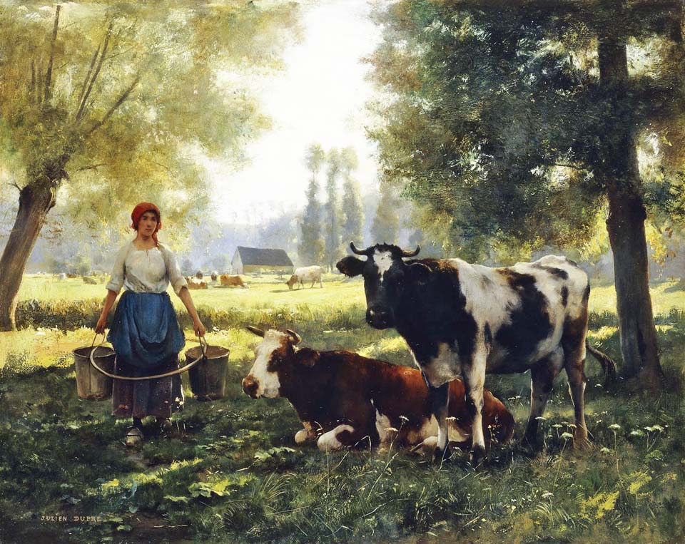Milkmaid with her cows àn a summer day