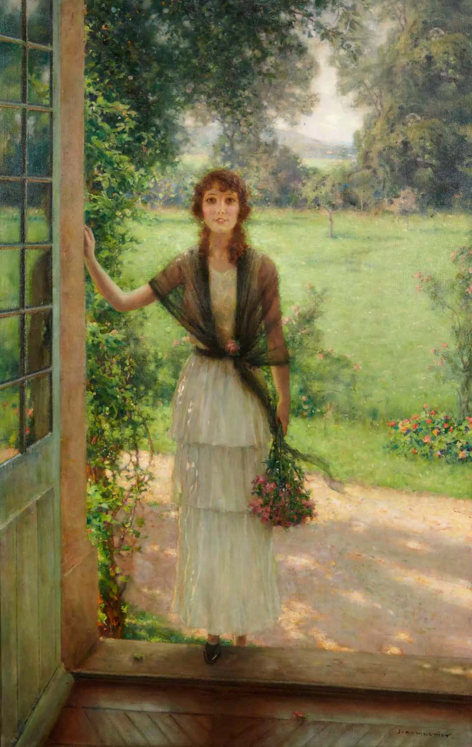 Young woman in front of the garden